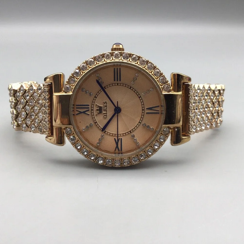 OLEVS Womens Watch 34mm Gold Tone Crystals Bracelet Champagne New Battery
